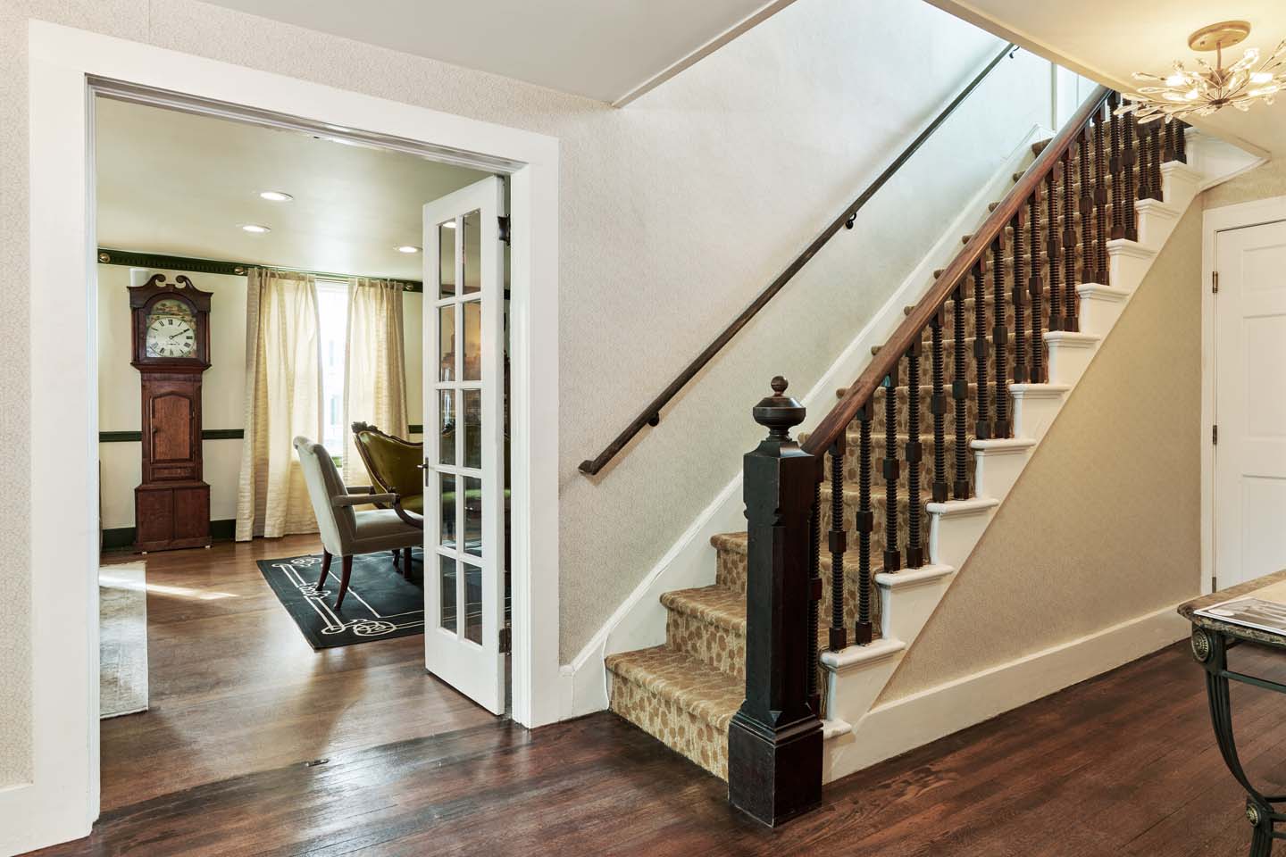 Entry foyer with staircase and runner